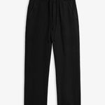 The Holiday Linen Trouser in black — front view showing the drawstring waistband