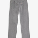 The Jeans Relaxed Straight Fit in light grey — back view with a rubber patch