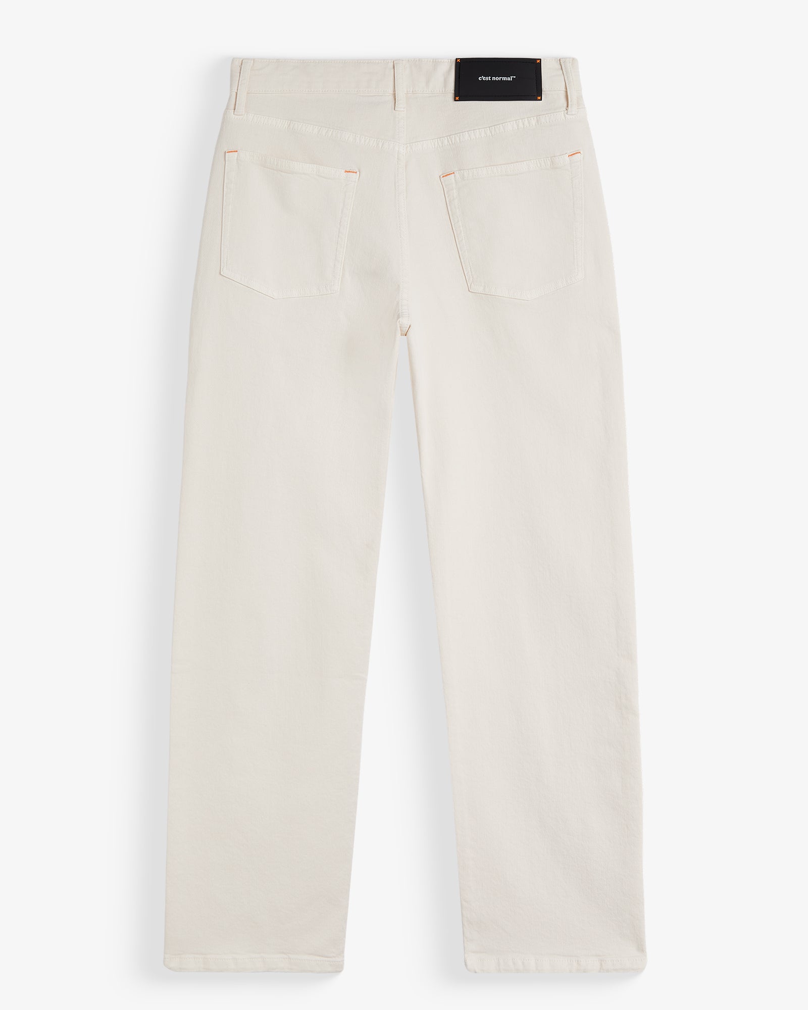 The Jeans Relaxed Straight Fit in ecru — back view with the black C'est normal rubber patch