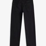 The Jeans Relaxed Straight Fit in Jet Black — back view with the C'est normal rubber patch