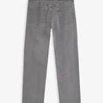 The Jeans Relaxed Straight Fit in light grey — back view with the black C'est normal rubber patch