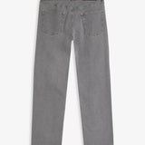 The Jeans Relaxed Straight Fit in light grey — back view with the black C'est normal rubber patch