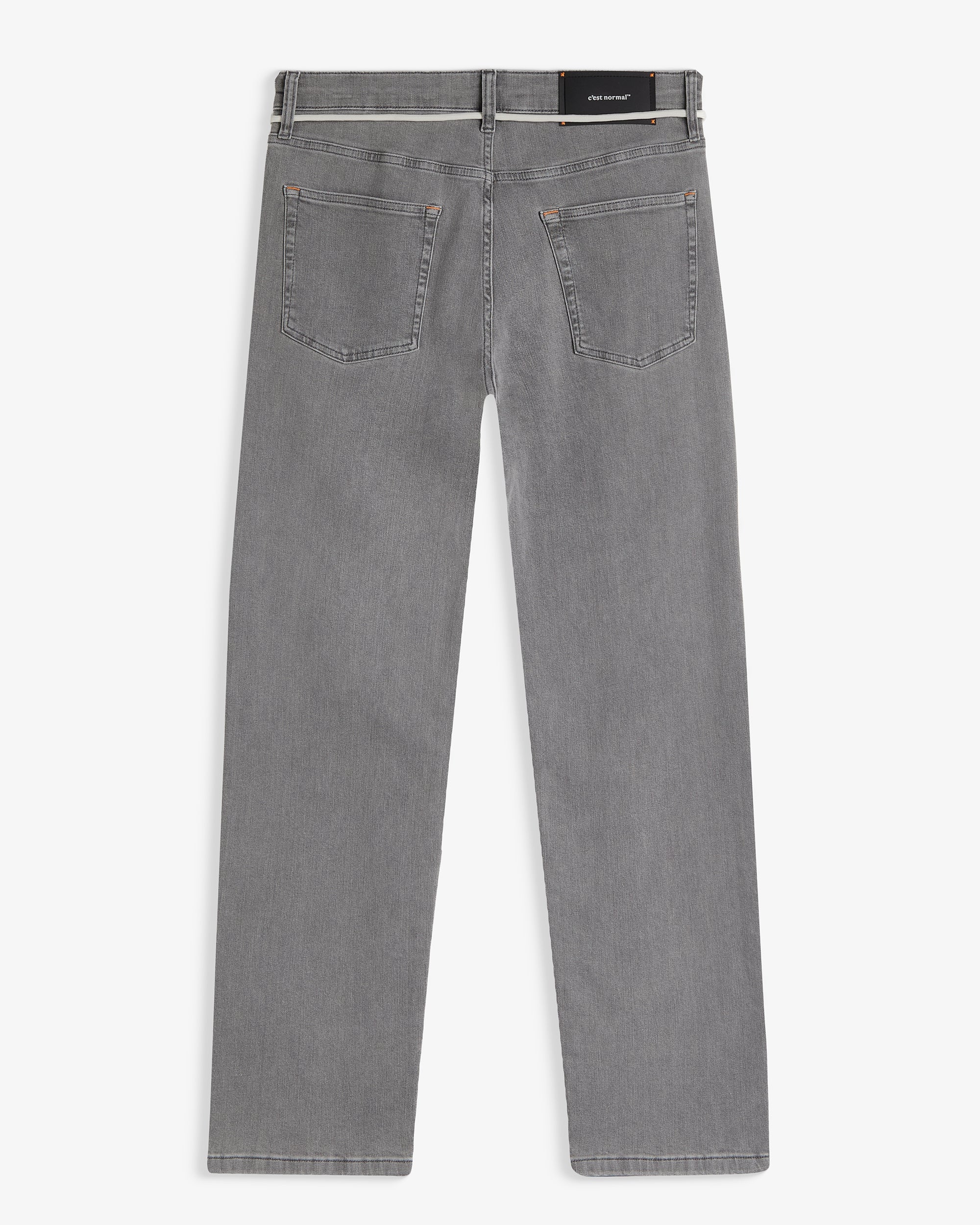 The Jeans Relaxed Straight Fit in light grey — back view with the black C'est normal rubber patch