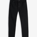 A front view of The Jeans Slim Fit in Jet Black, laid flat on a white background. The image highlights the clean slim silhouette, five-pocket design, and zip fly with top button.