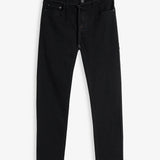 A front view of The Jeans Slim Fit in Jet Black, laid flat on a white background. The image highlights the clean slim silhouette, five-pocket design, and zip fly with top button.