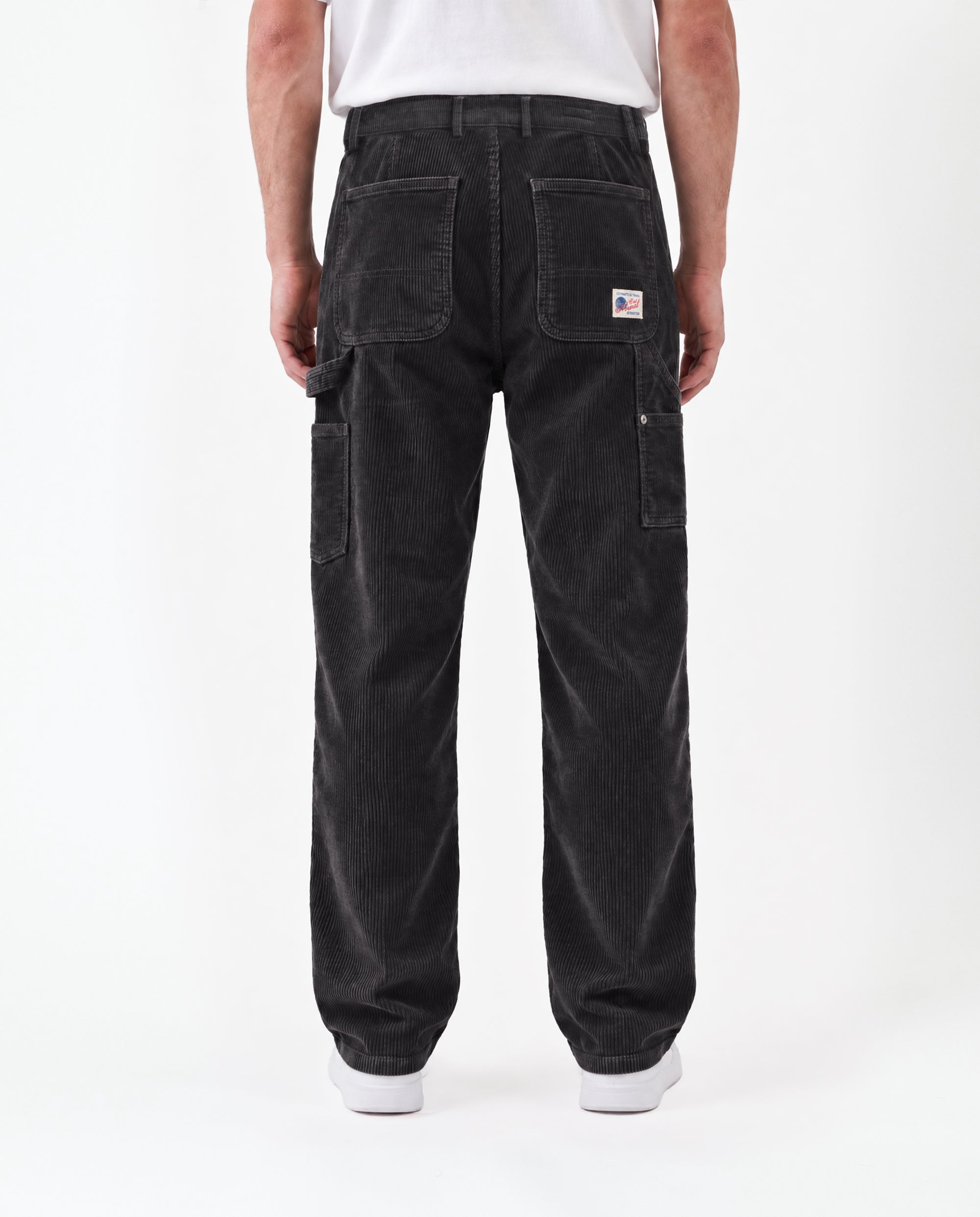 The Lille Cord Carpenter Pant in anthracite — back view with utility pockets