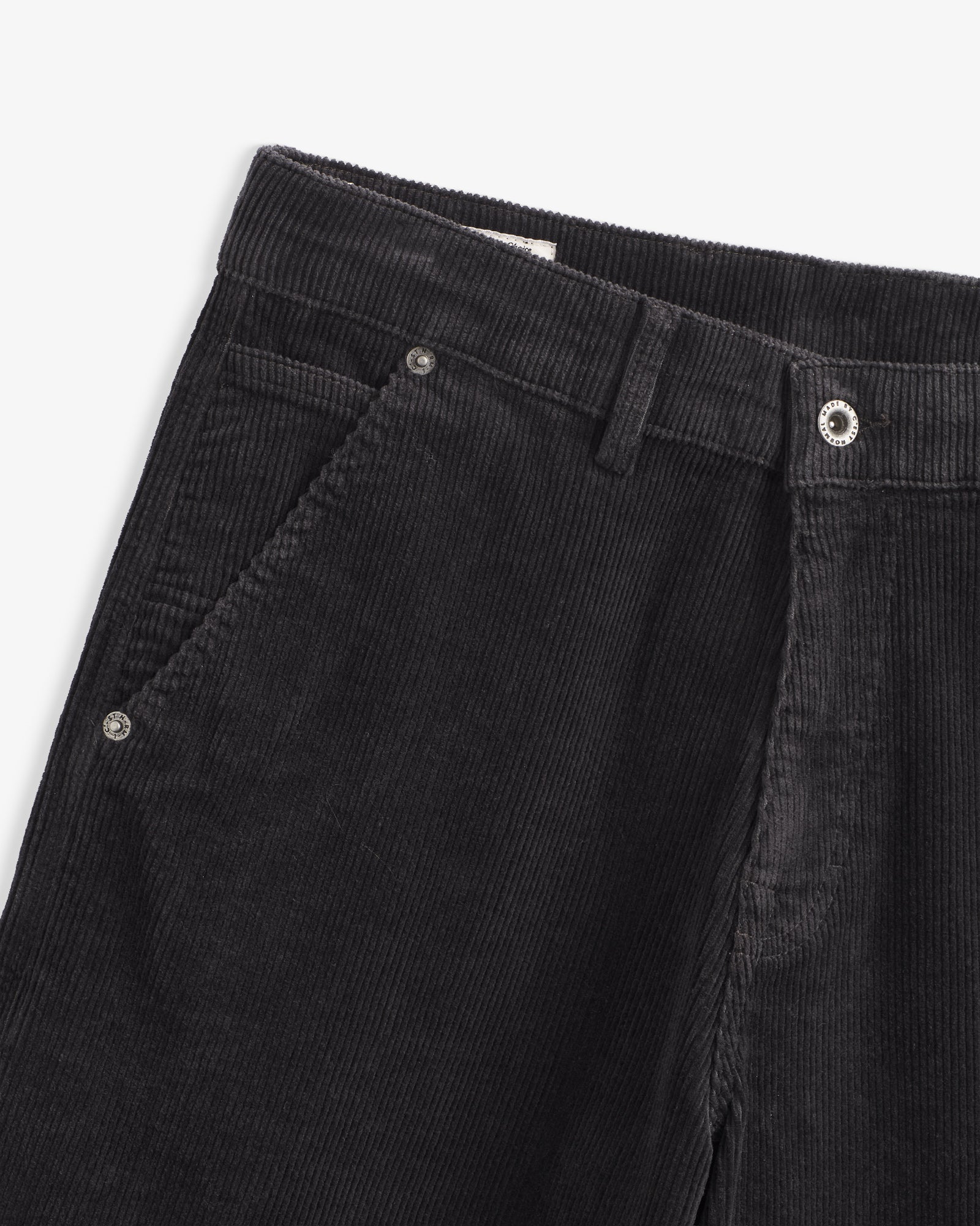 The Lille Cord Carpenter Pant in anthracite — close-up of the waistband and corduroy texture