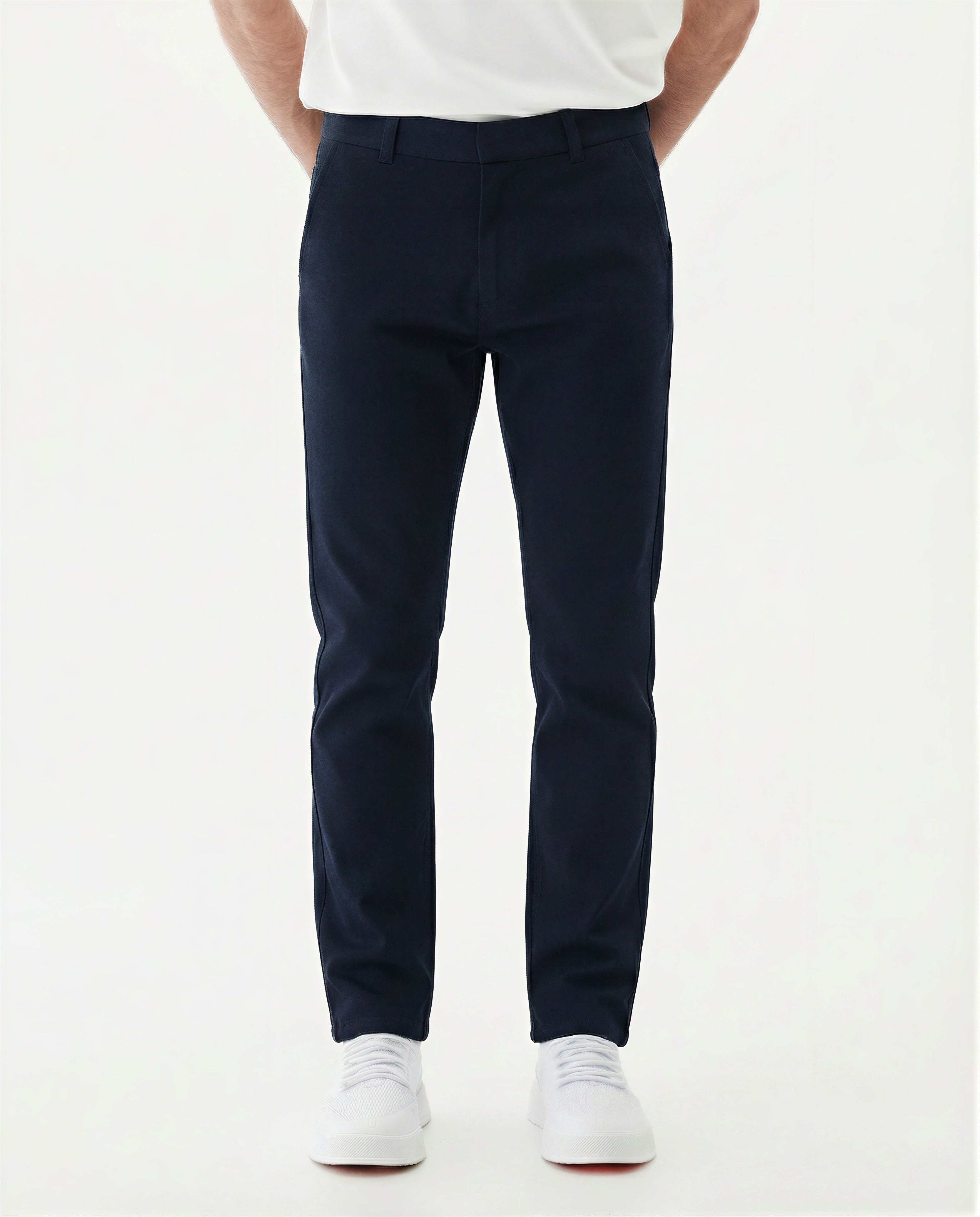 The Proper Pant Classic Straight Fit in navy — worn with white sneakers