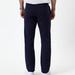 The Proper Pant Regular Fit in navy — back view showing the welt pockets and straight leg