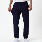 The Proper Pant Regular Fit in navy — showing the four-way stretch fabric