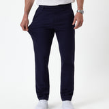 The Proper Pant Regular Fit in navy — showing the four-way stretch fabric