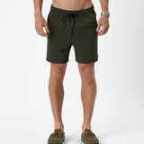 The Shorts in khaki — front view showing the drawstring and small C'est normal logo