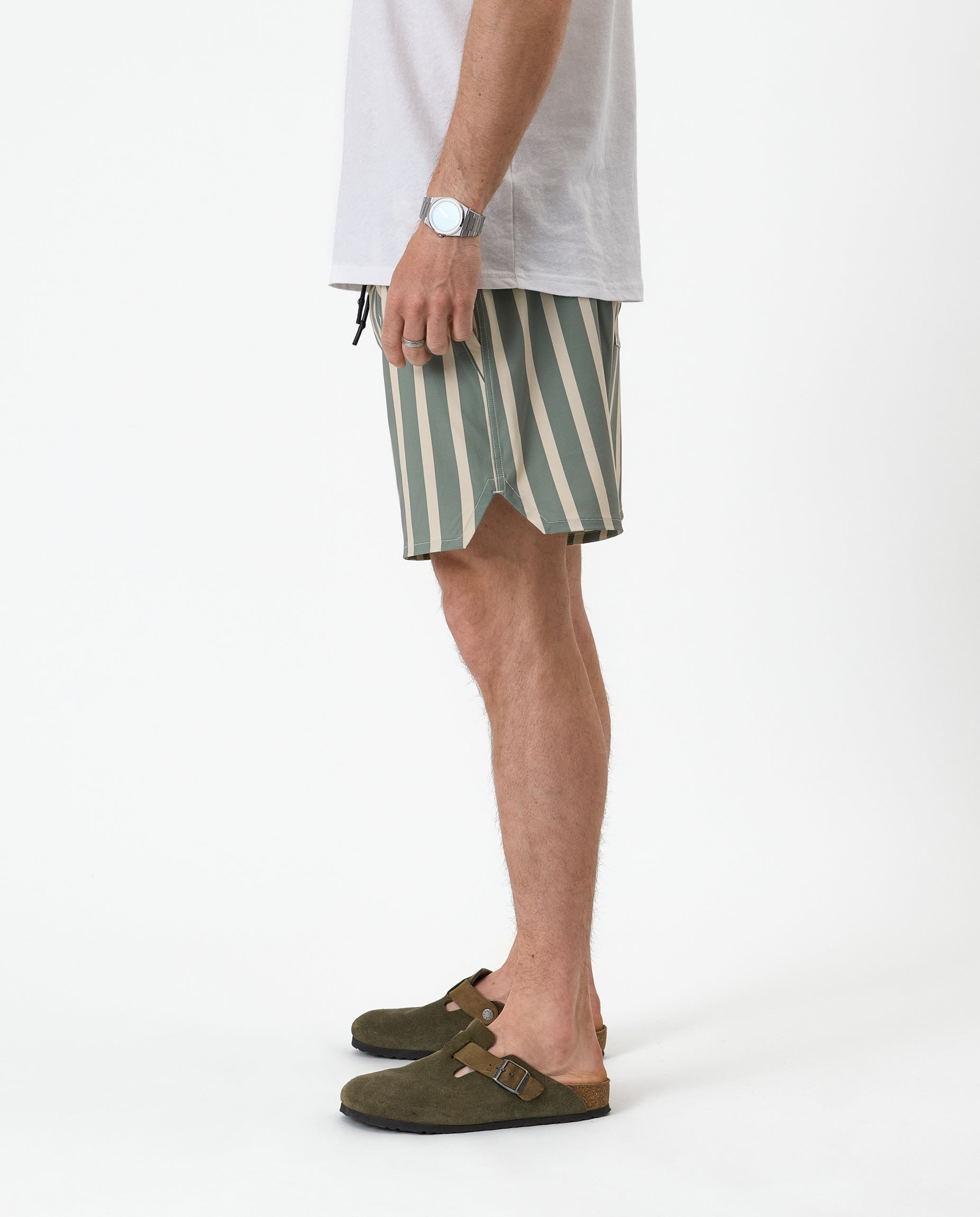 The Shorts in Lombok Stripe — side view showing the notched hem and vertical stripes