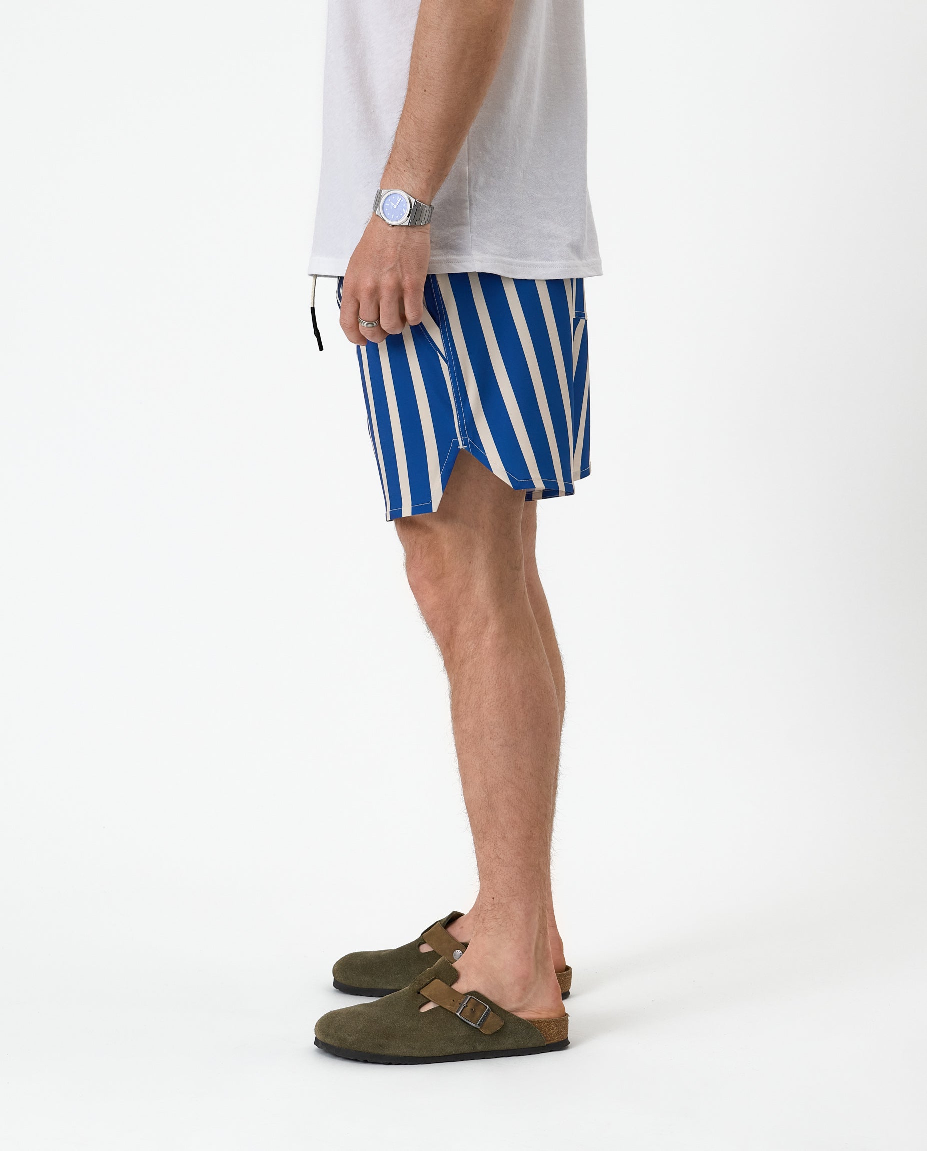 The Shorts in nautical stripe — side view showing the curved notched hem
