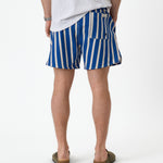The Shorts in nautical stripe — back view showing the rear pocket and vertical stripes