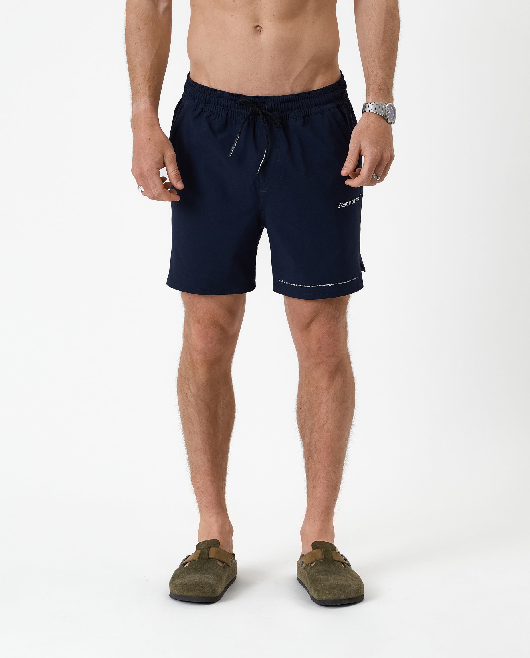 The Shorts in navy — front view with white C'est normal branding and drawstring