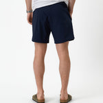 The Shorts in navy — rear view showing the back pocket
