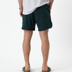The Shorts in pine — back view showing the rear pocket and fit
