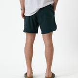 The Shorts in pine — back view showing the rear pocket and fit