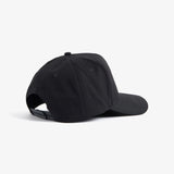 A back view of The Snapback Cap in black, laid flat on a white background. The image highlights the adjustable snapback closure.