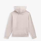 The Toulouse Hoodie in beige — back view showing C'est normal branding on the back