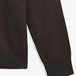 The Toulouse Hoodie in brown melange — close-up of the ribbed cuff and knit texture