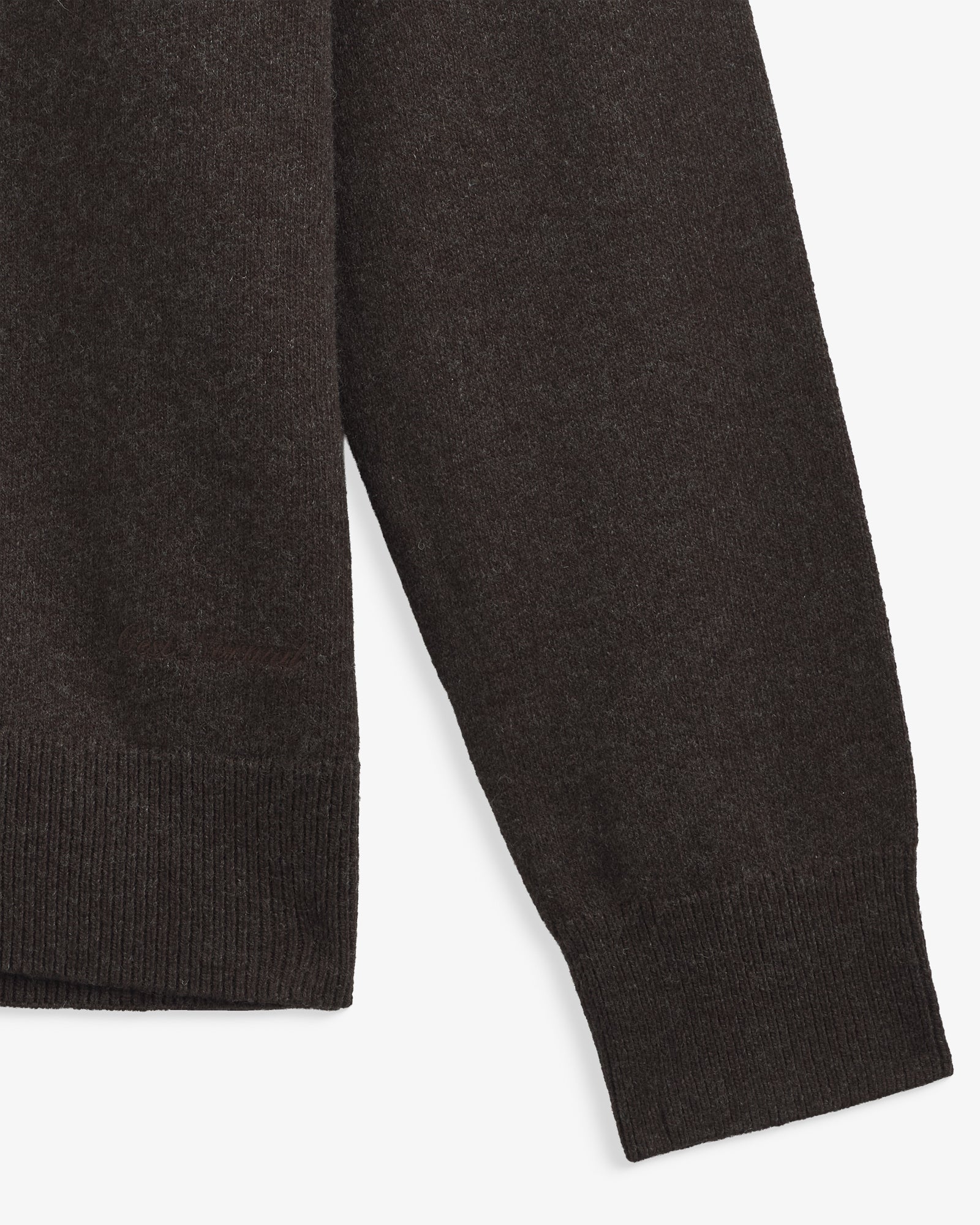 The Toulouse Hoodie in brown melange — close-up of the ribbed cuff and knit texture
