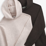 The Toulouse Hoodie in brown melange — folded with beige melange hoodie
