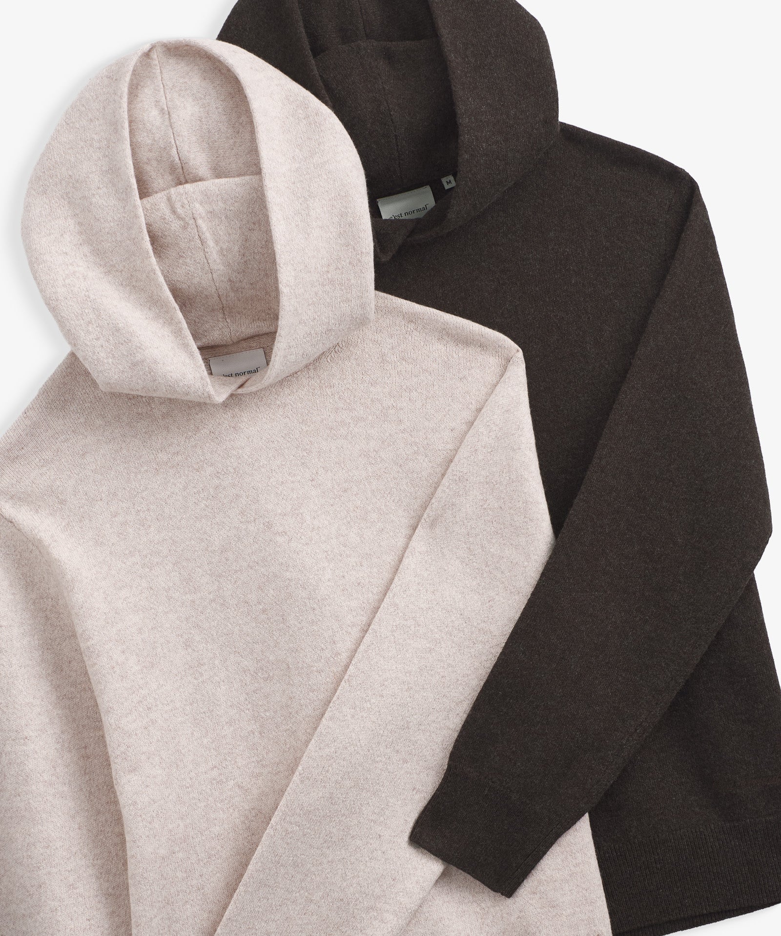 The Toulouse Hoodie in brown melange — folded with beige melange hoodie