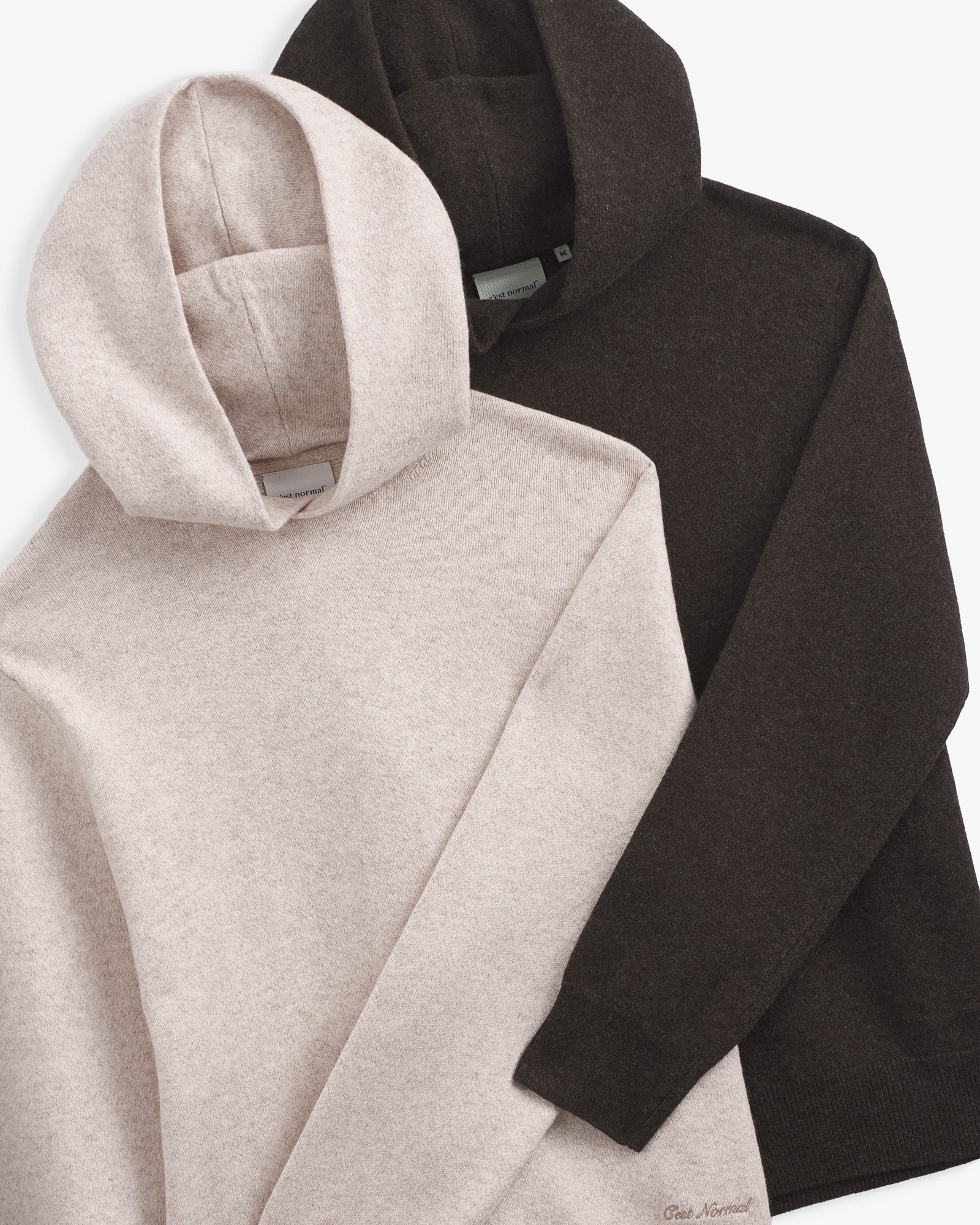 The Toulouse Hoodie in brown melange — folded with beige melange hoodie