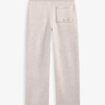 The Toulouse Pant in beige — back view featuring a back pocket with C'est normal branding