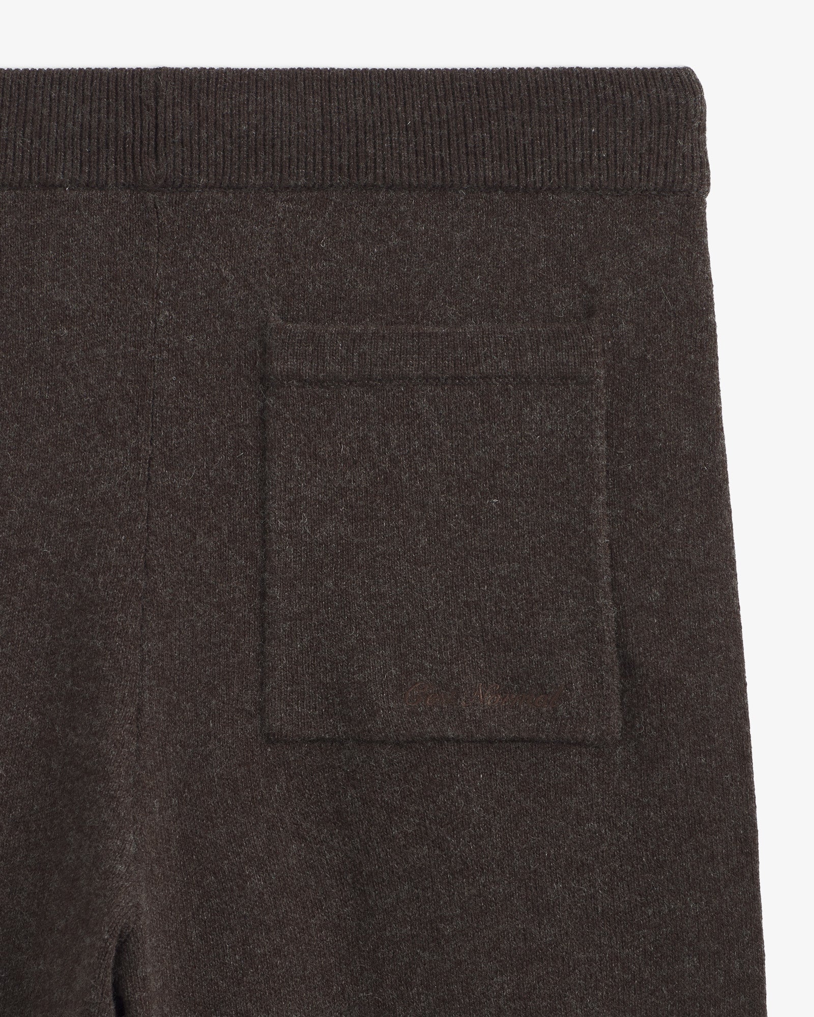 The Toulouse Pant in brown melange — close-up of the back pocket and knit texture