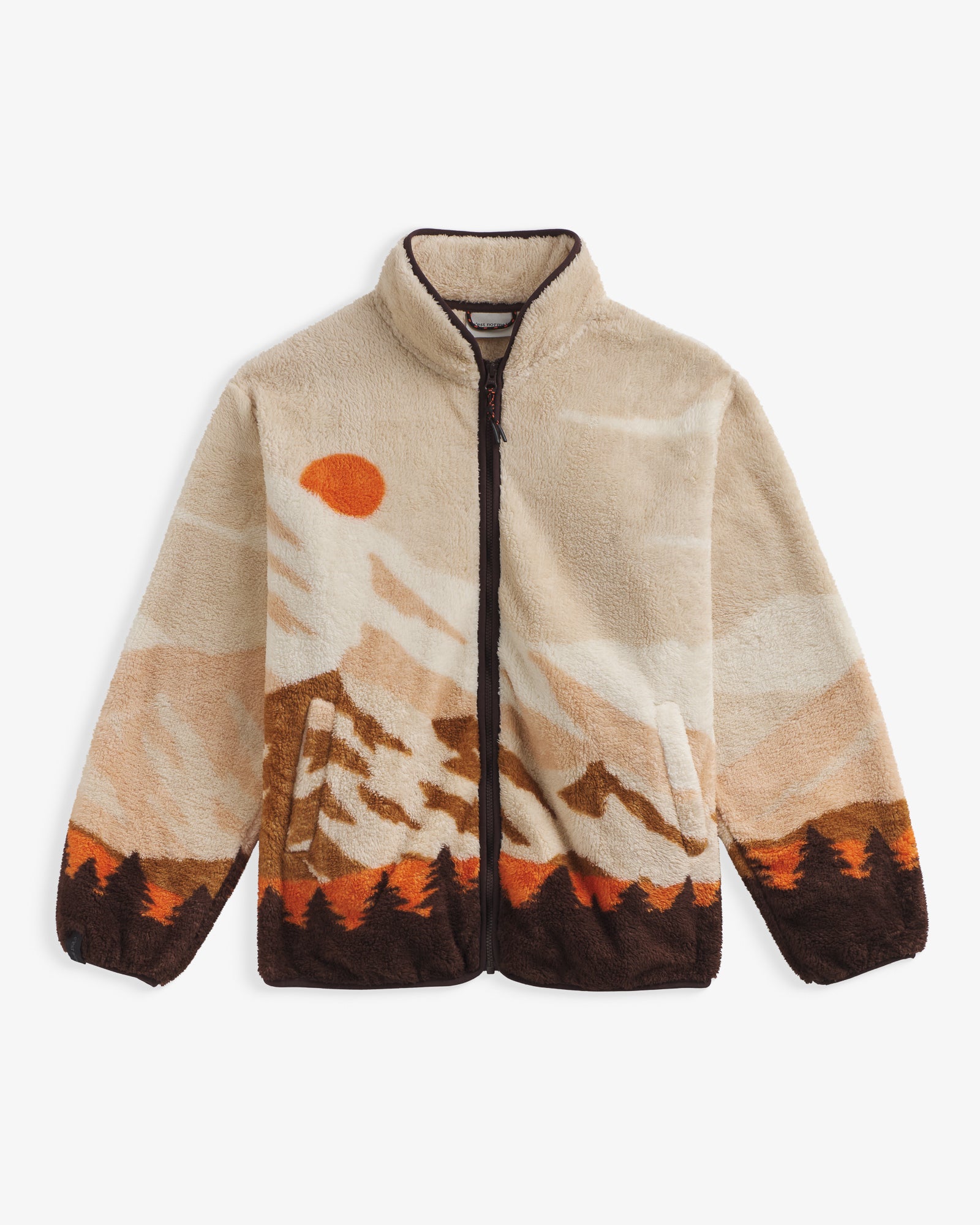The Wilderness Jacket in nature print — front view showing mountain and sun landscape pattern