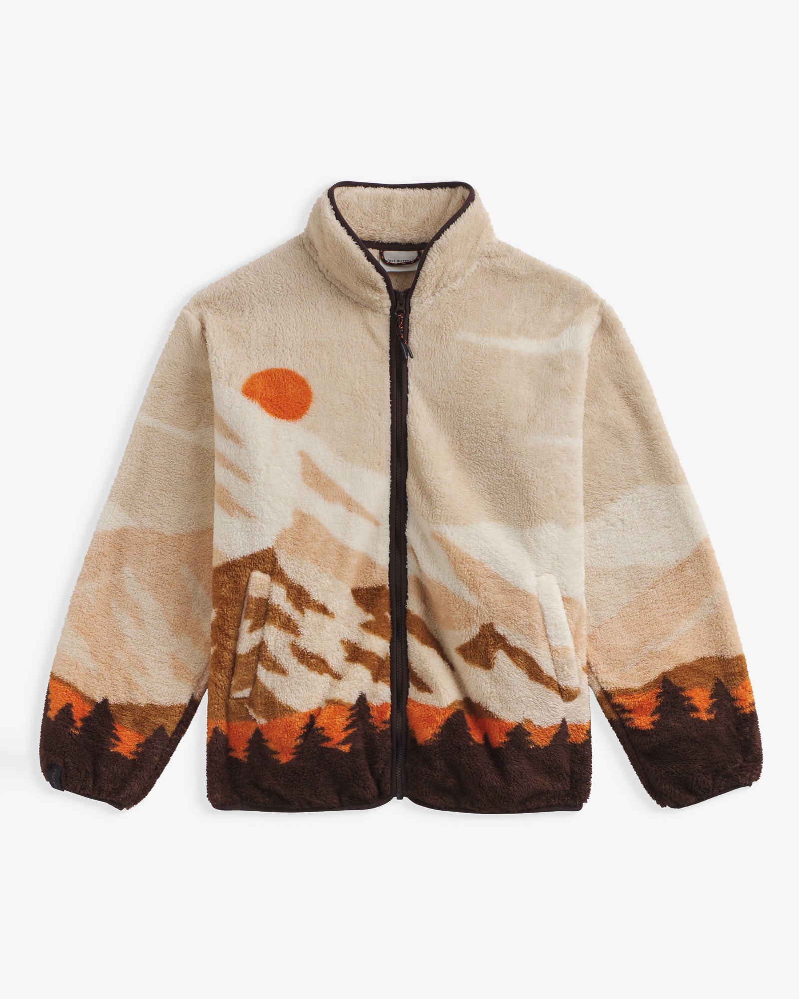 The Wilderness Jacket in nature print — front view showing mountain and sun landscape