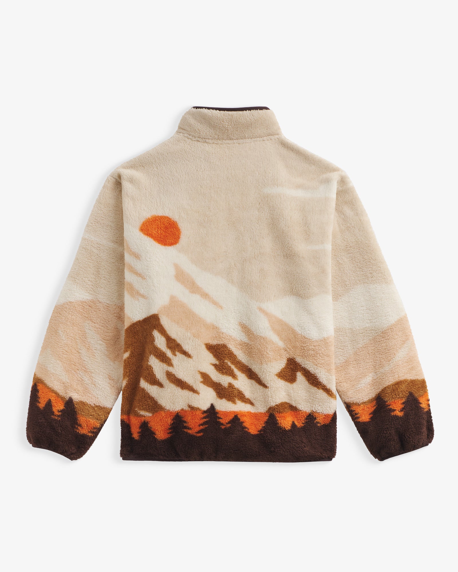 The Wilderness Jacket in nature — back view showing the mountain landscape pattern