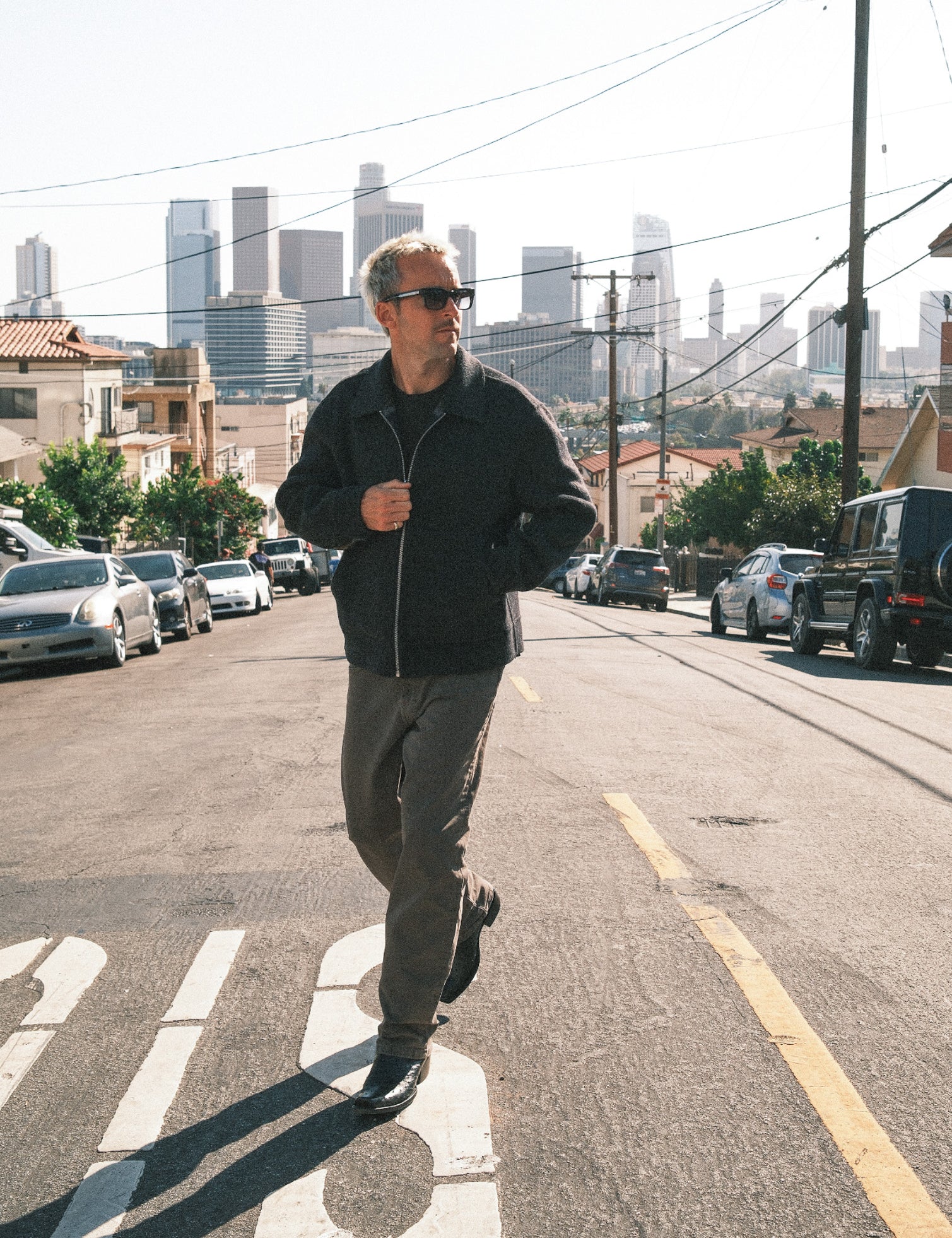 Motion 5 Pocket Classic Straight Pant in dark mole — worn in an urban street setting