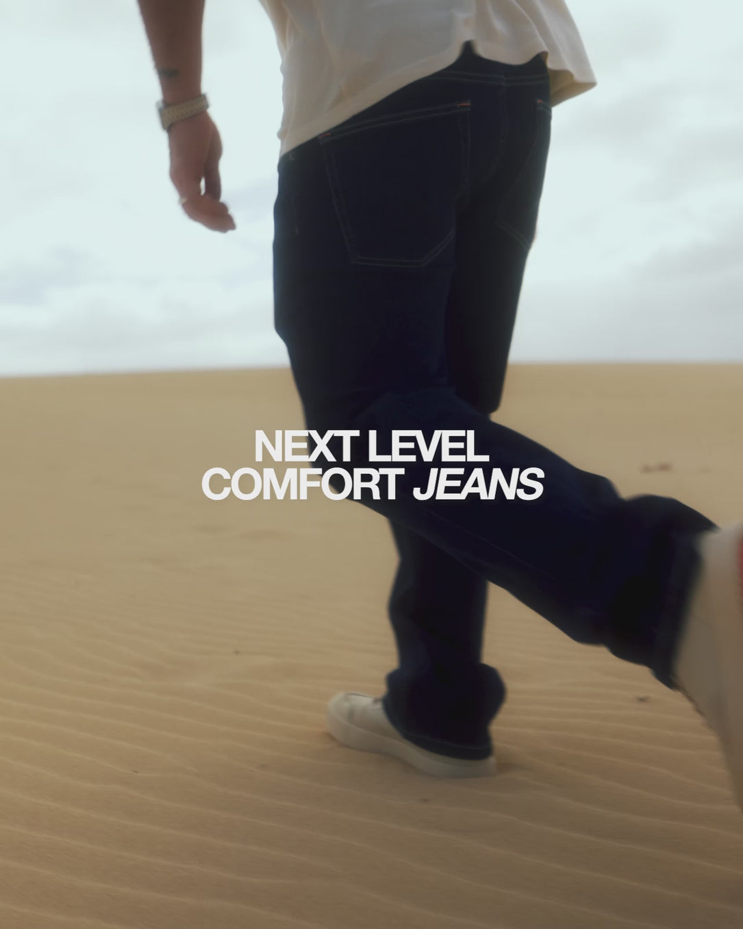 Model wearing C'est normal Jeans