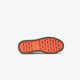 The Dynamic Waterproof Sneaker 2.0 Low in khaki — bottom view of the orange rubber grid sole