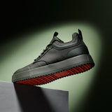 The Dynamic Waterproof Sneaker 2.0 Low in khaki — side view showing the orange rubber sole